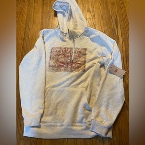 Levi’s size M hoodie. Off white color with red vintage picture.